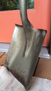 Used for scraping and scooping up loose material.