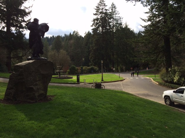 When entering from SW Park, follow the one way circle to the right. Park in the metered spaces. Sacagawea and the Chiming Fountain are below the Lewis and Clark Monument .  Walk up the exit to the loop circling 'The Coming of the White Man' to the right of the pedestrians in the road.  This is an exit but pedestrians can enter here.